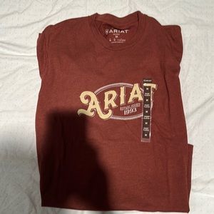 NWT - Ariat Men’s t-shirt. Rust color. Never worn. Size medium.